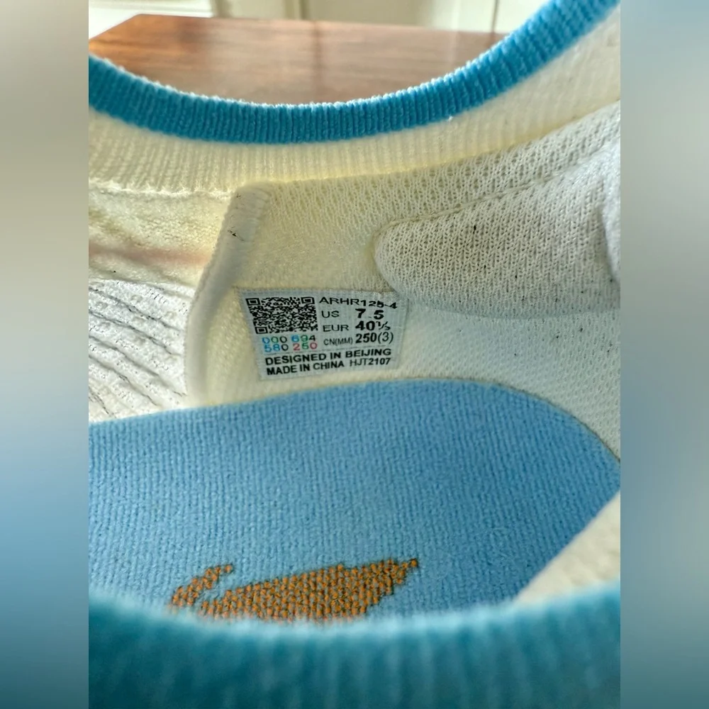 Li-Ning Essential Sneakers in White, Blue, and Orange - Picture 7 of 10